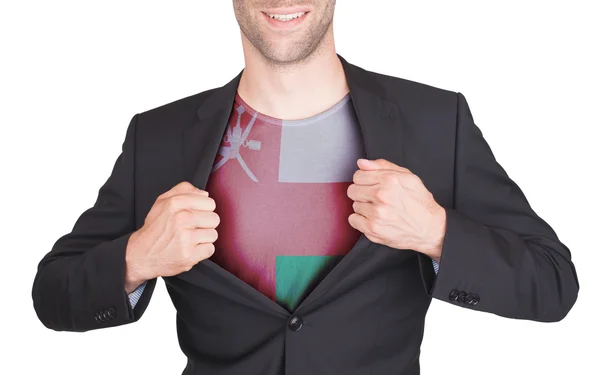 Hombre de negocios abriendo traje para revelar camisa con bandera —  Fotos de Stock