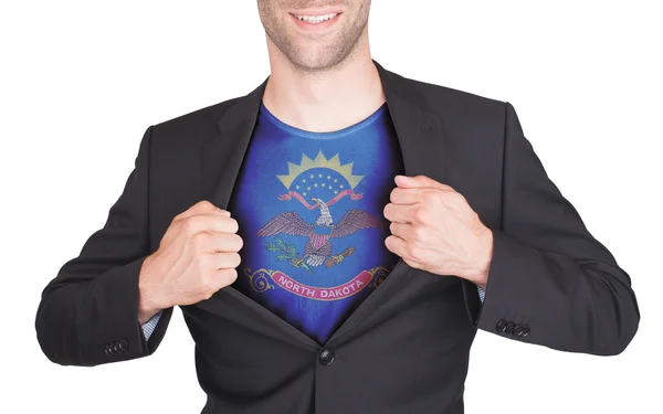 Hombre de negocios abriendo traje para revelar camisa con bandera estatal — Foto de Stock