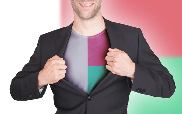 Uomo d'affari vestito di apertura per rivelare la camicia con bandiera — Foto Stock