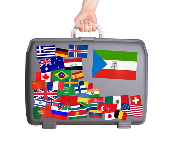 Used plastic suitcase with stickers — Stock Photo, Image