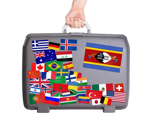 Used plastic suitcase with stickers — Stock Photo, Image