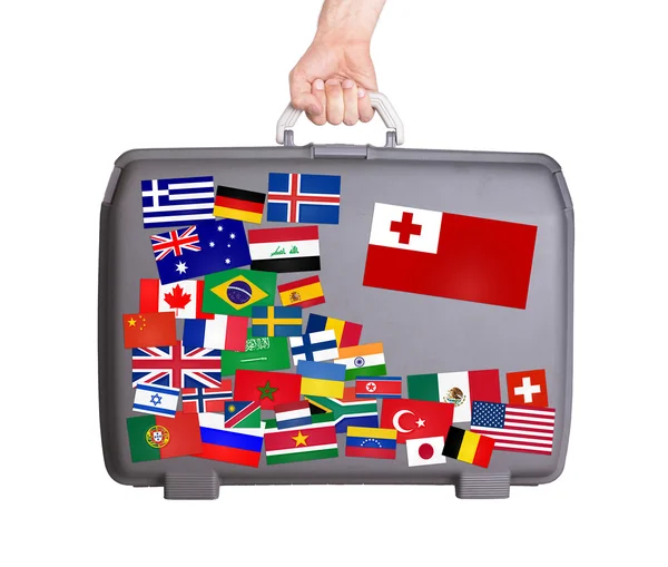 Used plastic suitcase with stickers — Stock Photo, Image