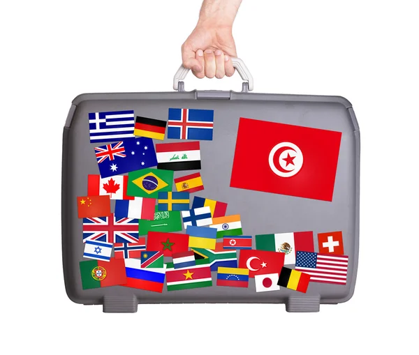 Used plastic suitcase with stickers — Stock Photo, Image