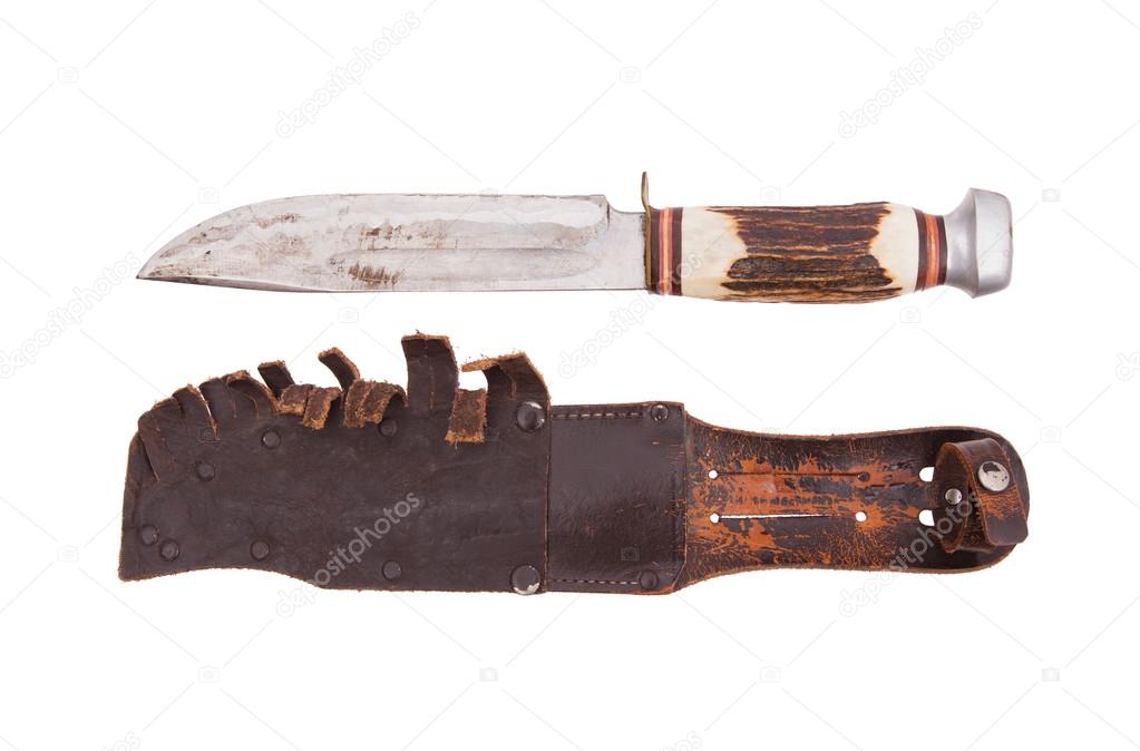 Very old bowie knife isolated