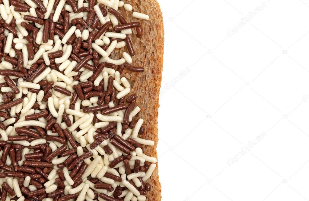 Typical dutch lunch; bread with chocolate sprinkles (hagelslag), isolated