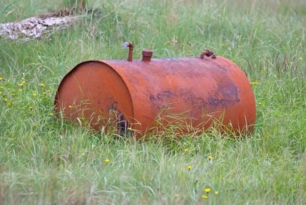 Old Rusty Barrel Resting Field Grass Flowers Surround — Stock Photo, Image