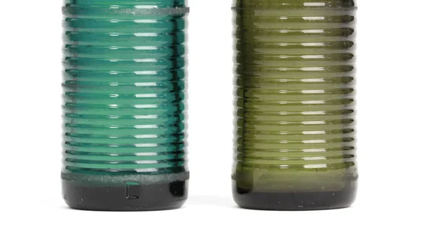 Часть Двух Старых Бутылок Синей Зеленой Газировки Изолированных Белом — стоковое фото
