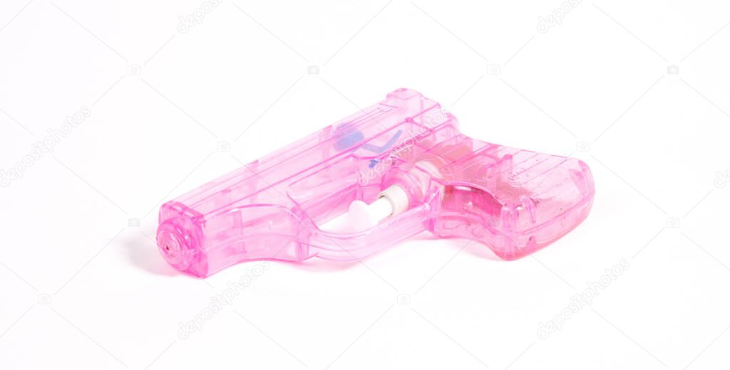 SImple pink small water pistol isolated on white background