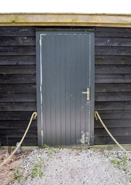 Simple door viewed from the outside, selective focus
