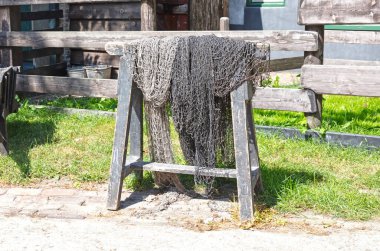 Vintage fishing nets, drying in the sun, ready to be used once again