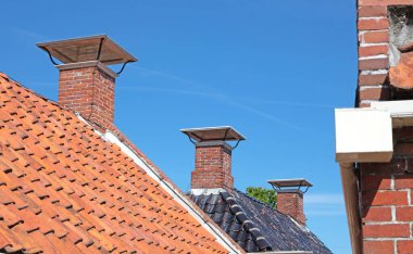 Very old houses with red roofs in the Netherlands