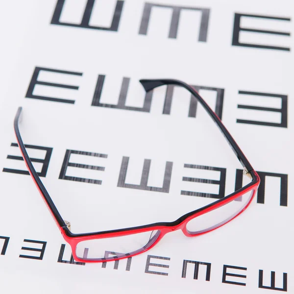 Lectura de anteojos y gráfico ocular — Foto de Stock