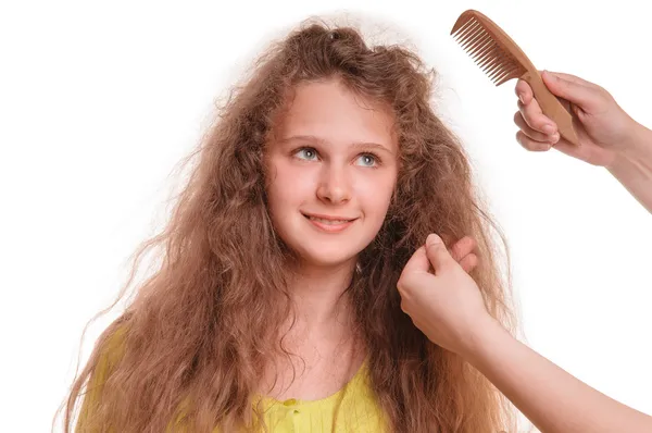 Girl and hairdresser — Stockfoto