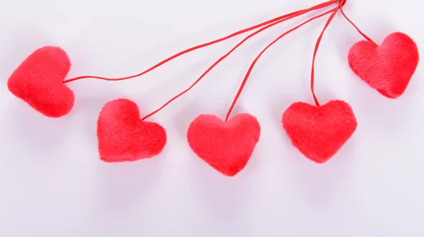 Fünf dekorative rote Herzen — Stockfoto