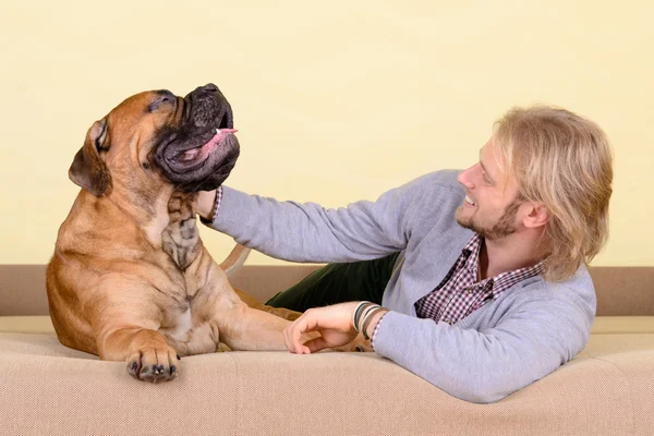 Man with big dog — Stock Photo, Image