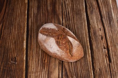 Beautiful rustic bread on a wooden table