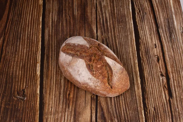 Beautiful rustic bread on a wooden table