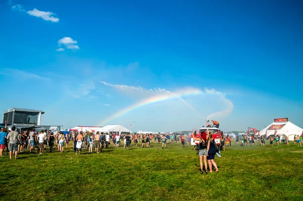 Rainbow in music festival Stock Picture
