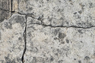 Çatlak beton dokuyu kapatma arkaplanı.