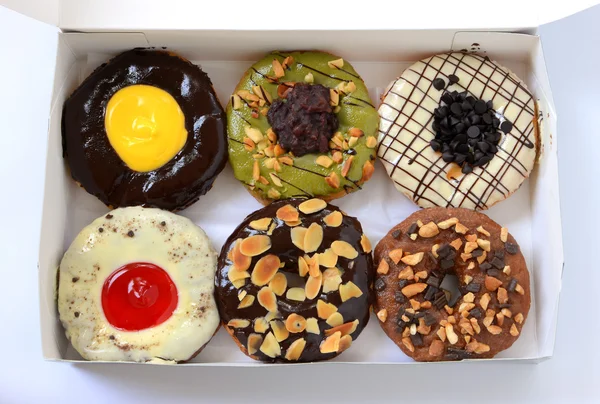 Set of donuts in box — Stock Photo, Image