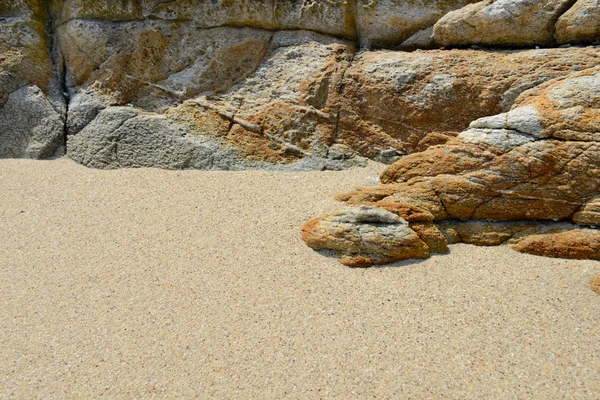 Zand strand rotsen textuur — Stockfoto