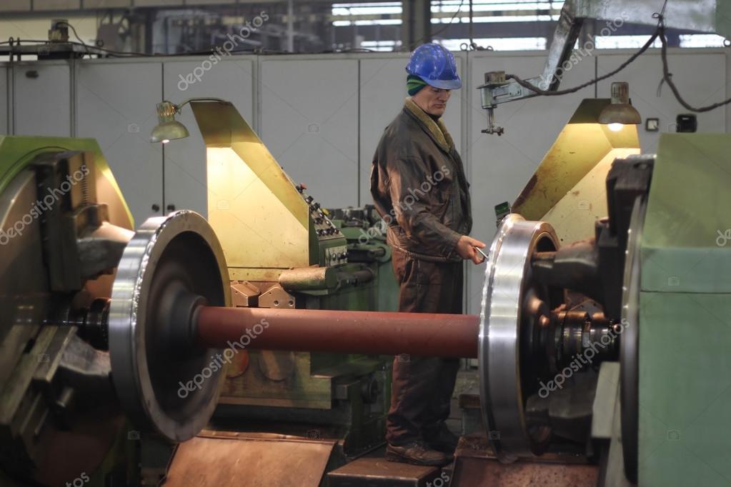 Worker in metal processing industry — Stock Photo © branex 24479749