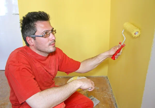 Painter in action, interior decoration — Stock Photo, Image