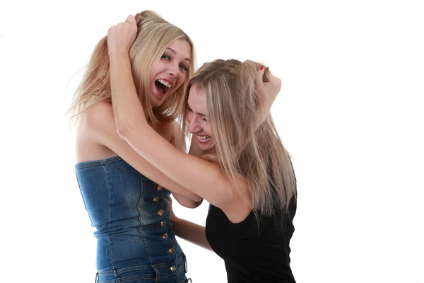 Girls dragged by the hair Stock Image