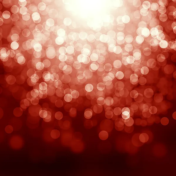 Fond rouge de Noël avec des lumières déconcentrées — Photo