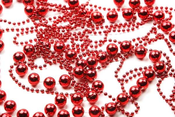 Red beads as holiday background — Stock Photo, Image