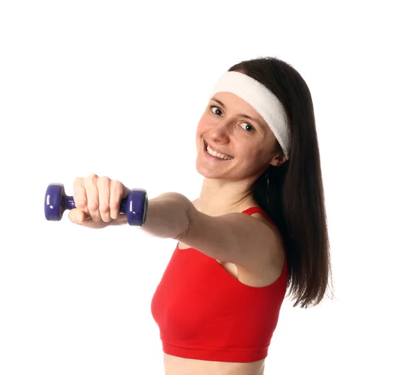 Mutlu genç bir kadın ile bir dumbbell egzersiz — Stok fotoğraf