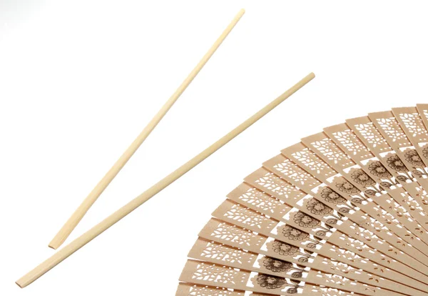 Chopsticks and fan — Stockfoto