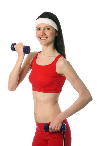 Happy young woman exercising with dumbbells — Stock Photo, Image