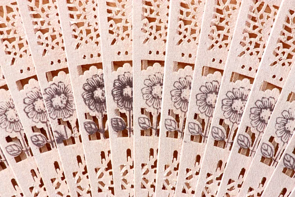 Macro tiro de um ventilador com padrão floral — Fotografia de Stock