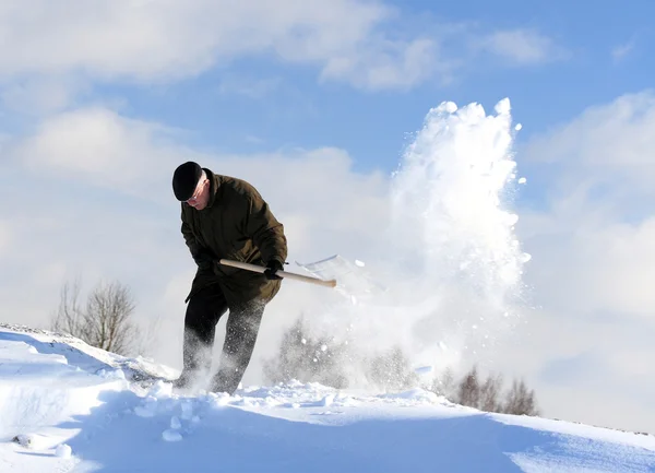 Handmatige sneeuwruimen — Stockfoto