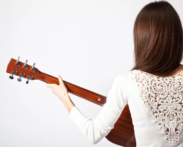 Brunette with a guitar — Stock Photo, Image