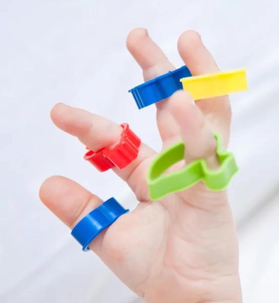 Toys on the baby's fingers — Stock Photo, Image