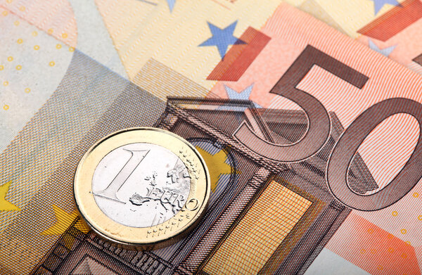 Euro banknote and coin