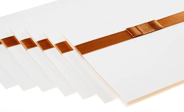 Ivory invitations with ribbon — Stock Photo, Image