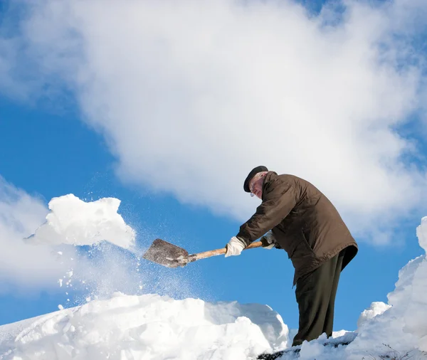 Handmatige sneeuwruimen — Stockfoto