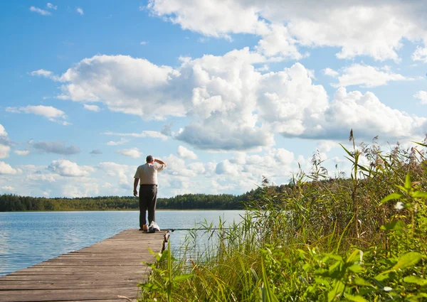 Fisherman on the lake — Stock Photo, Image