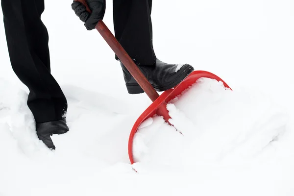 Removing snow with a shovel — Stock Photo, Image