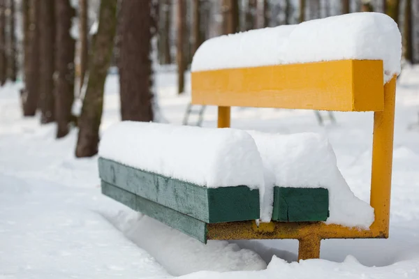 Bench under snow — Stock Photo, Image