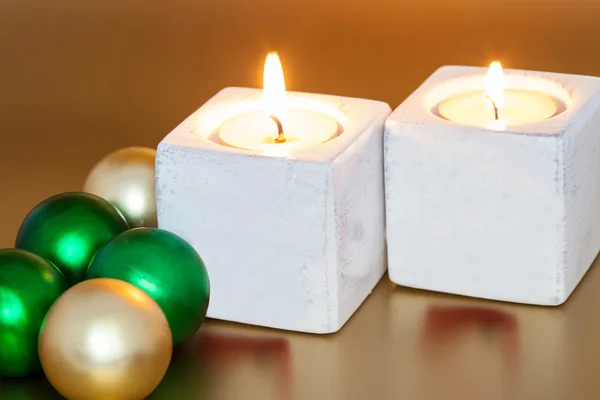 Christmas candles with toys — Stock Photo, Image