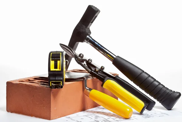 Construction tools and blueprint — Stock Photo, Image