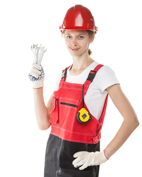 Trabalhador da construção em uniforme com ferramentas isoladas em branco — Fotografia de Stock