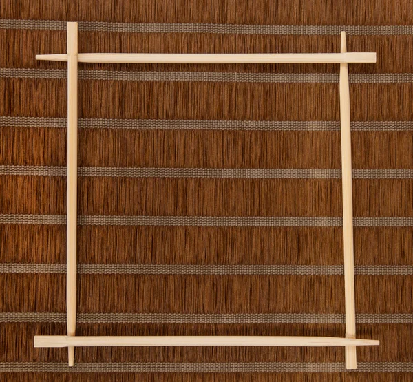Moldura decorativa de pauzinhos de bambu — Fotografia de Stock