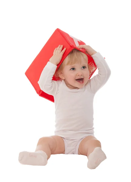 Happy baby girl with red box — Stock Photo, Image
