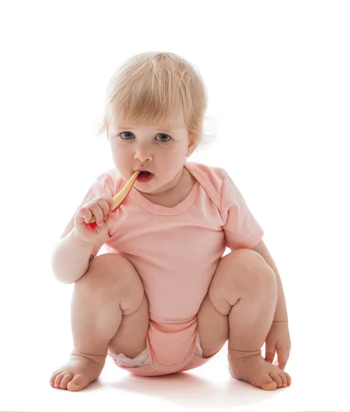 Petite fille avec une brosse à dents — Photo