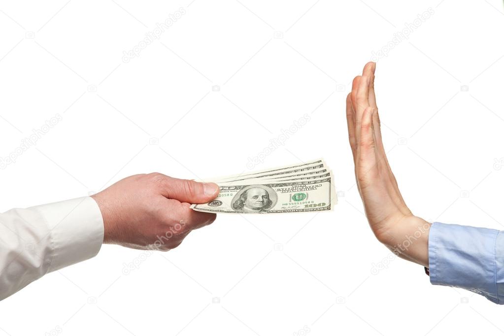 Human hands rejecting an offer of money